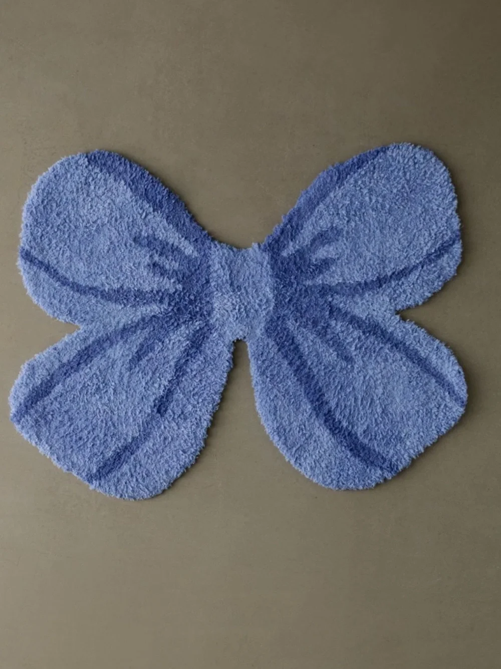 Urban Outfitters Blue Bow Shaped Bath Mat